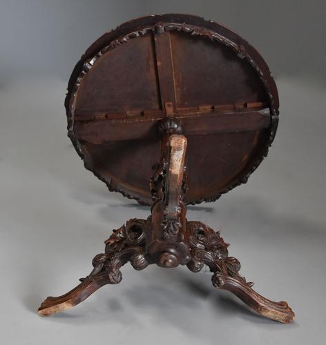 Late 19thc Black Forest carved linden wood centre table