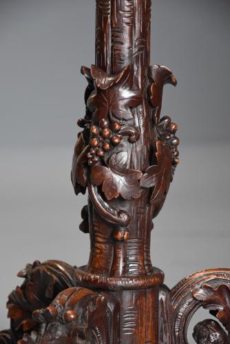 Late 19thc Black Forest carved linden wood centre table