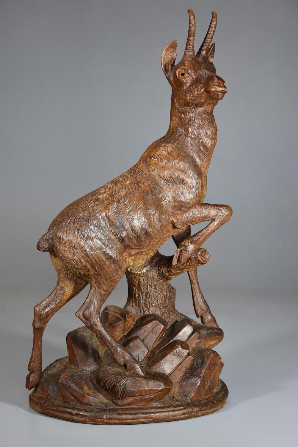 Late 19thc Black Forest finely carved linden wood figure of a chamois