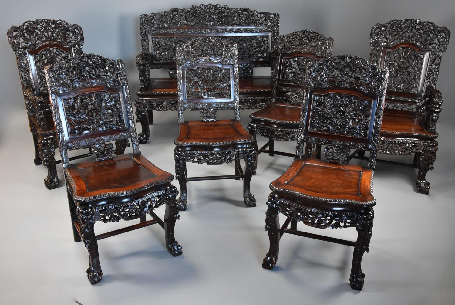 Superb quality 19thc Chinese profusely carved padouk seven piece suite