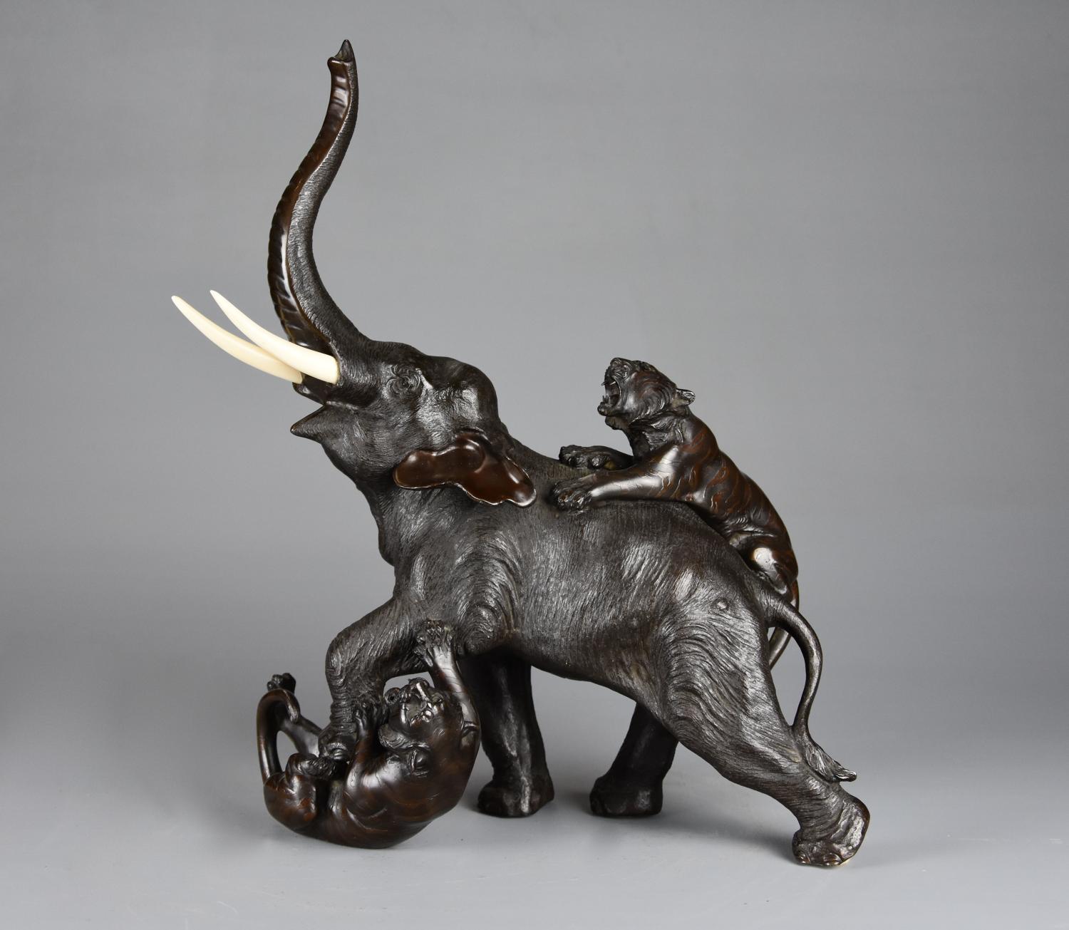 Fine quality 19thc Meiji Japanese bronze elephant & bronze group