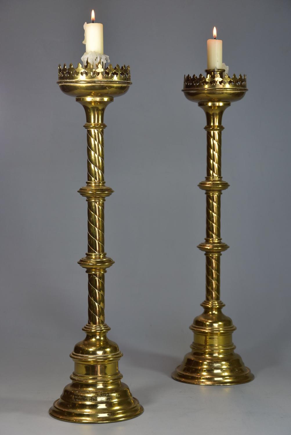 Pair of highly decorative late 19thc Gothic style brass candlesticks