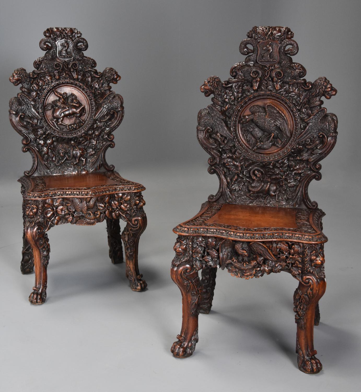 Pair of 19thc Exhibition quality carved oak chairs of large proportion