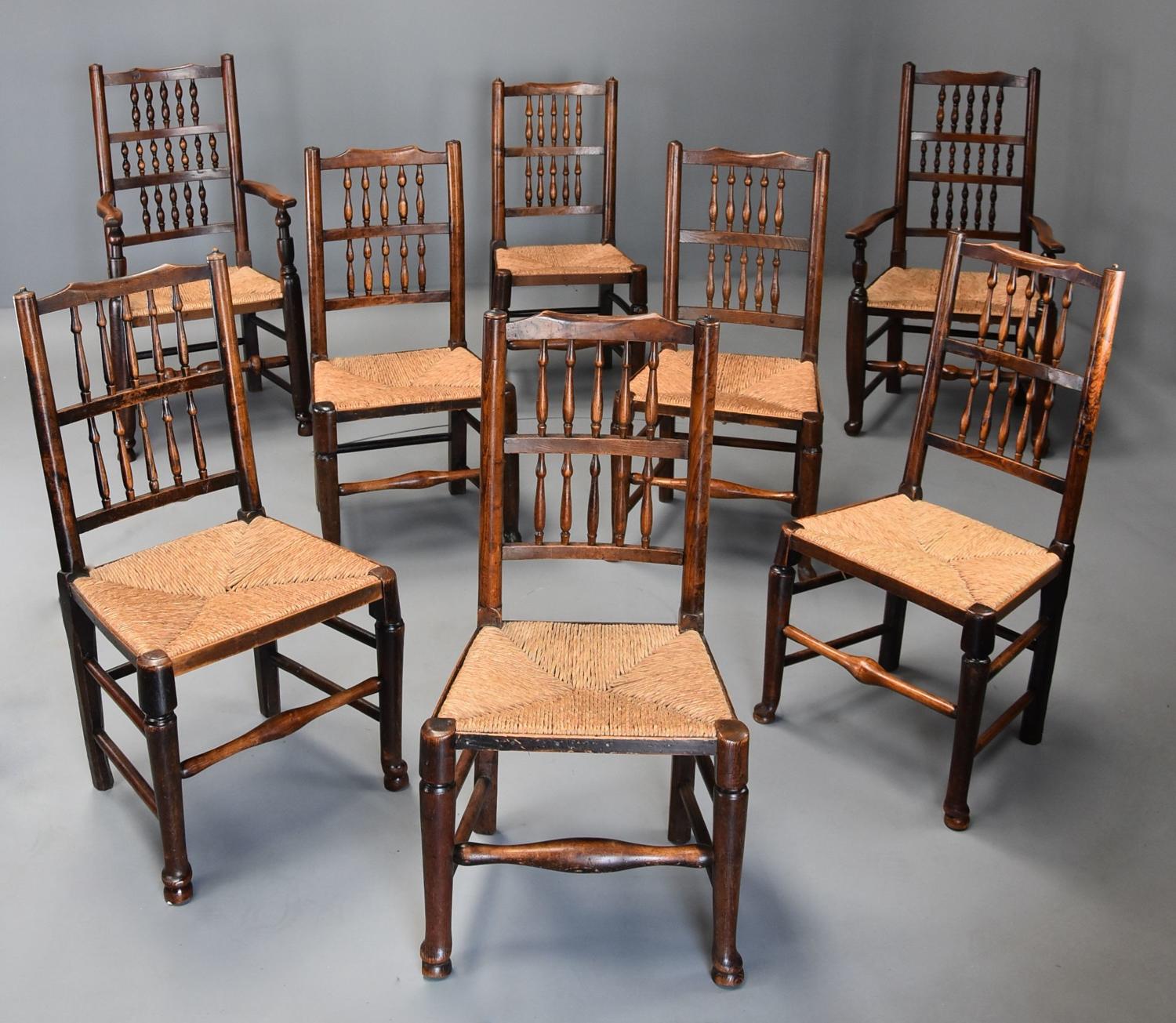 Matched set of eight 19thc ash spindle back chairs of superb patina