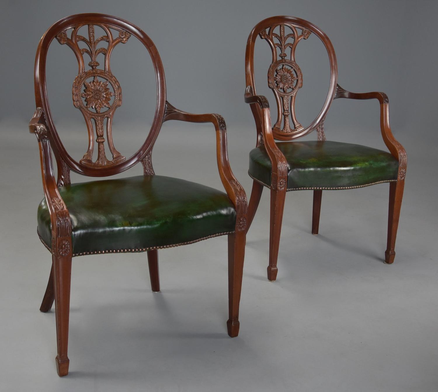 Pair of 19thc Hepplewhite style mahogany oval back open armchairs