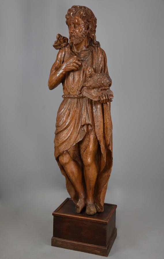 Large Continental 16thc carved limewood figure of St John the Baptist