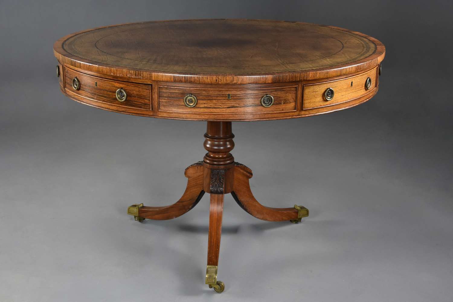 Early 19th century Regency rosewood drum table