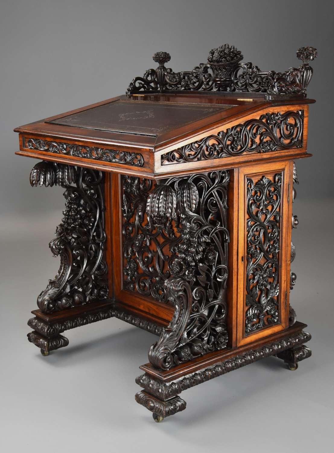Exquisite 19thc Anglo Indian padouk & satinwood carved davenport