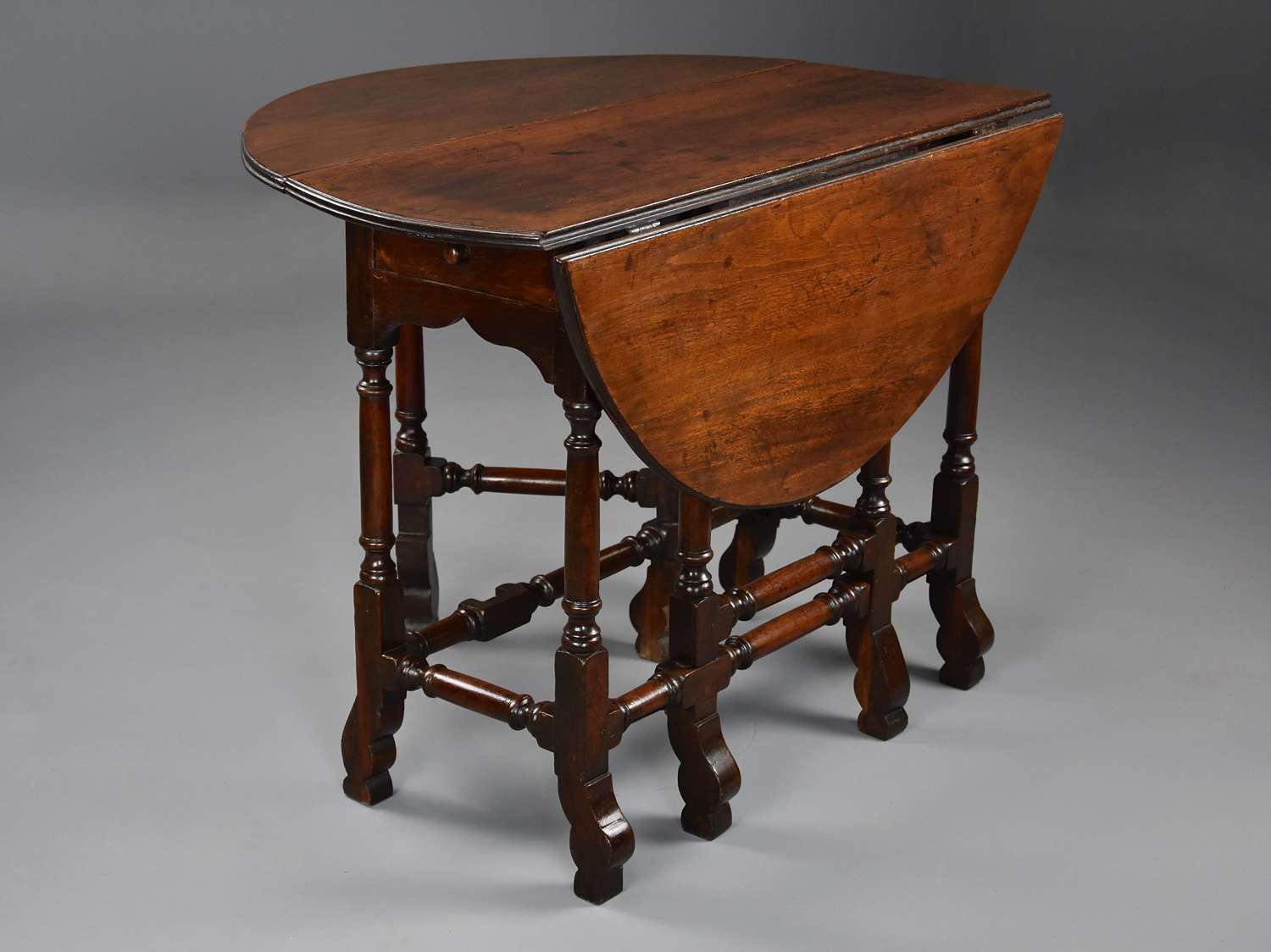Rare 18thc red walnut gateleg table of small proportions & fine patina