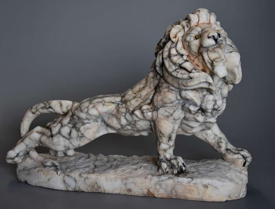 Highly decorative French Art Deco carved marble sculpture of a lion