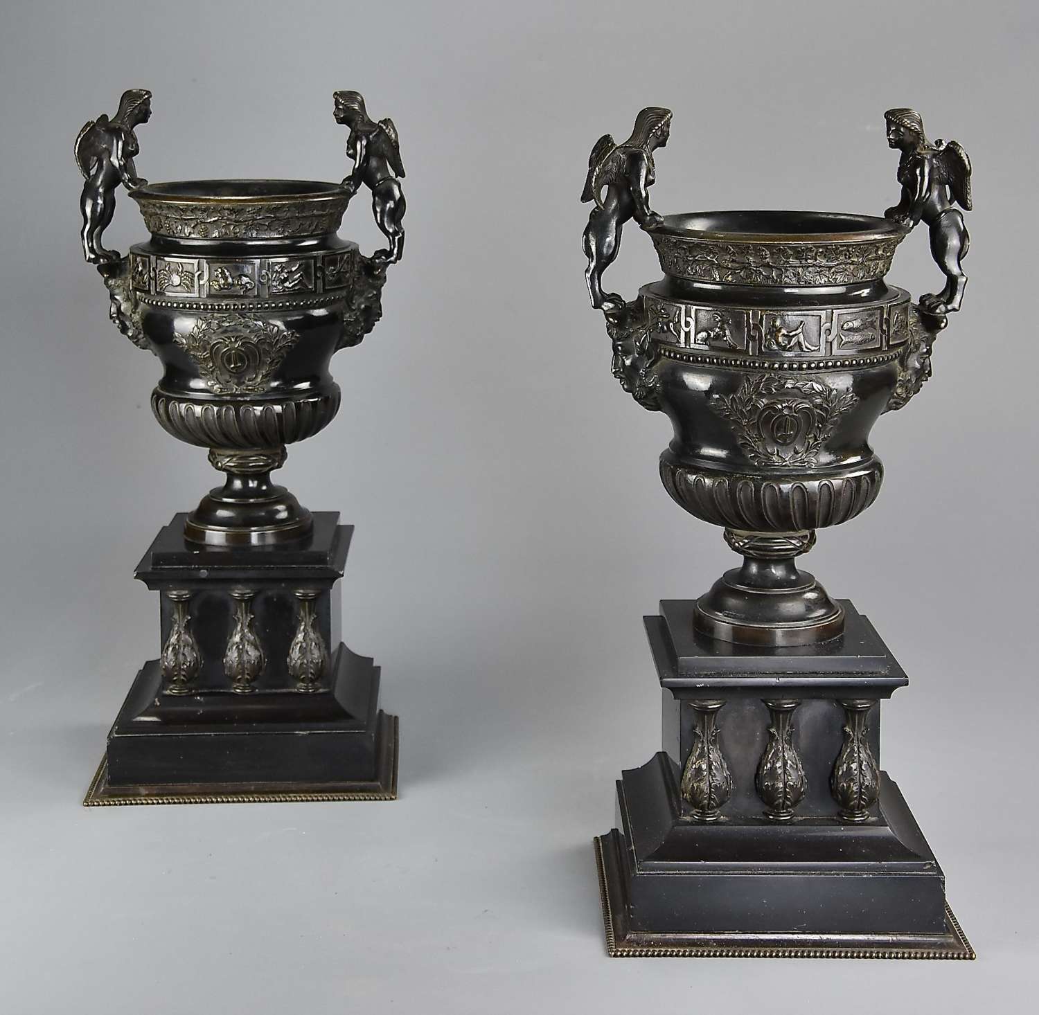 Pair of late 19thc bronze urns after a pair of urns at Versailles