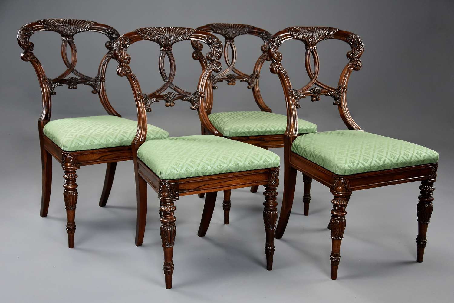 Superb quality set of four rosewood chairs of Indian influence