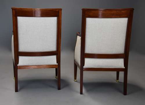 Pair of French Empire style mahogany upholstered armchairs