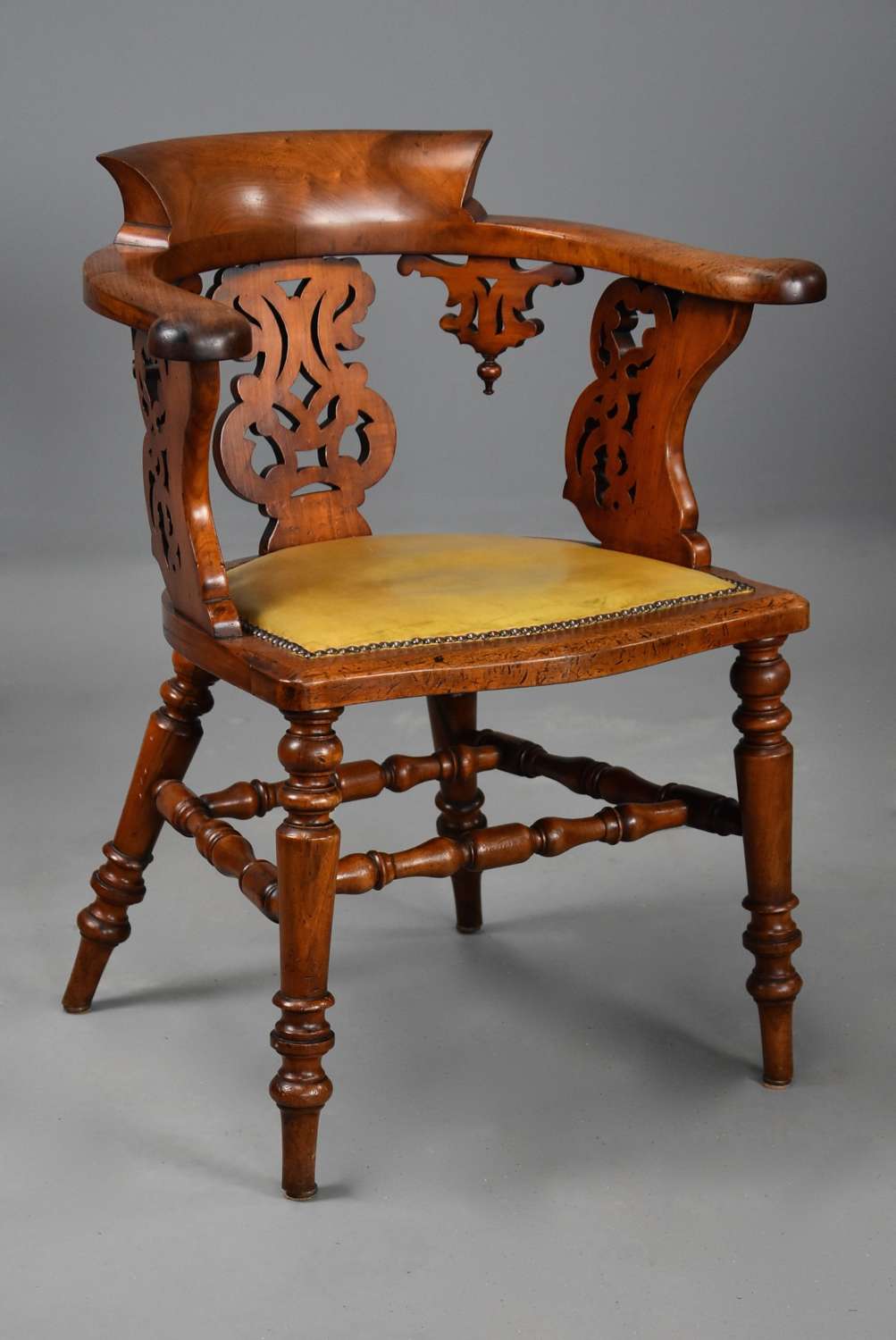 Mid 19thc walnut office armchair of fine patina
