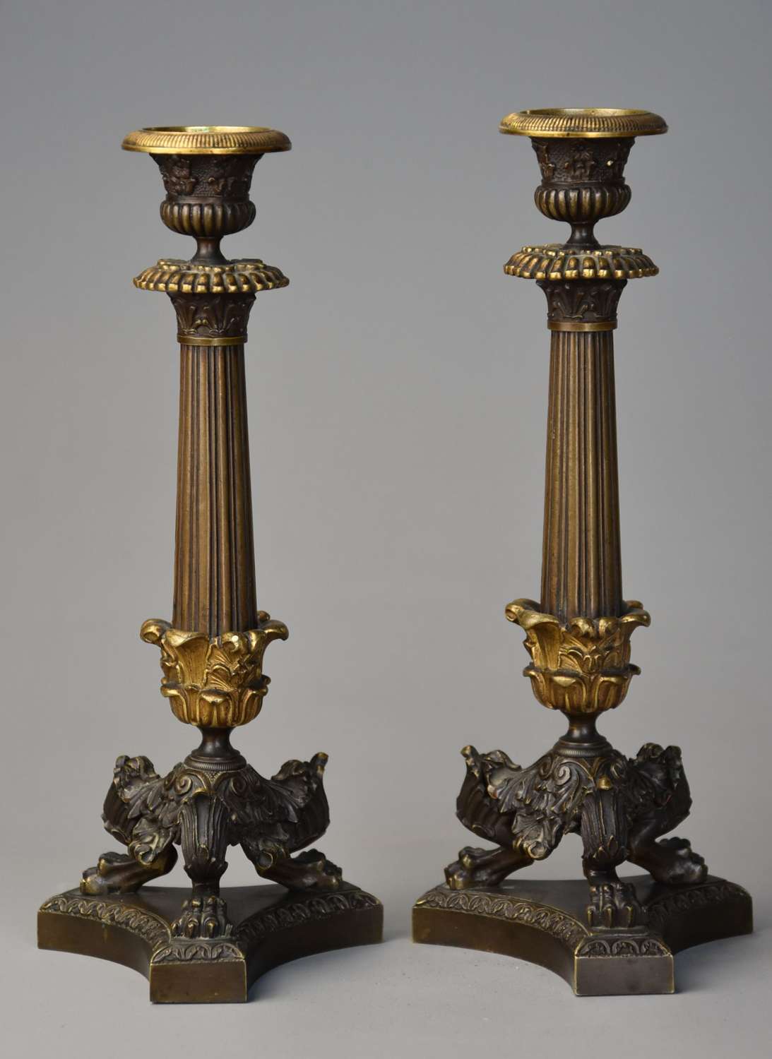 Fine quality pair of Regency bronze and gilt bronze candlesticks