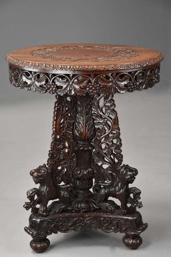 Mid 19thc Anglo Indian carved padouk centre table of fine patina