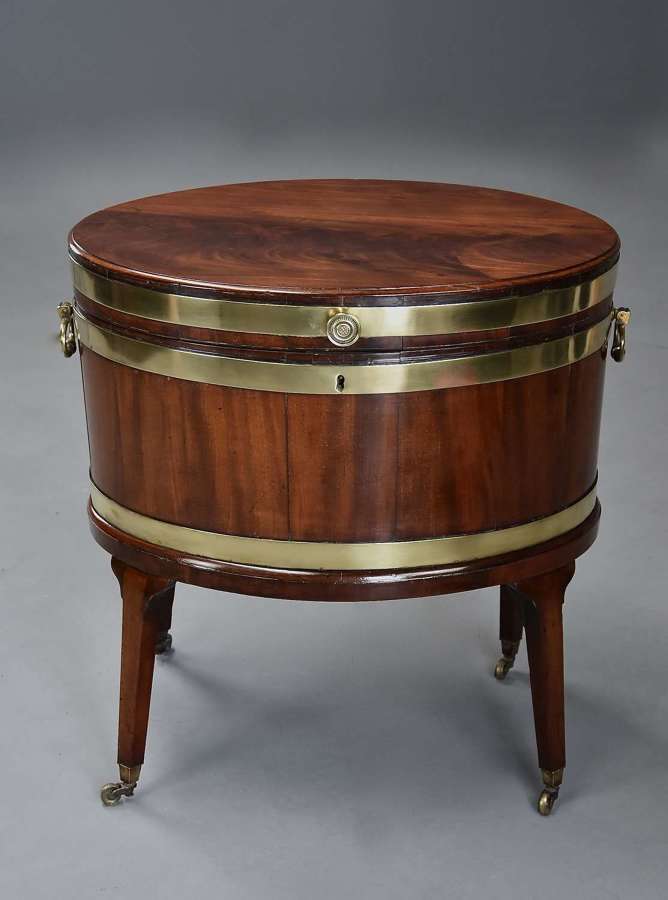 Large 18thc mahogany & brass bound oval cellarette of fine patina