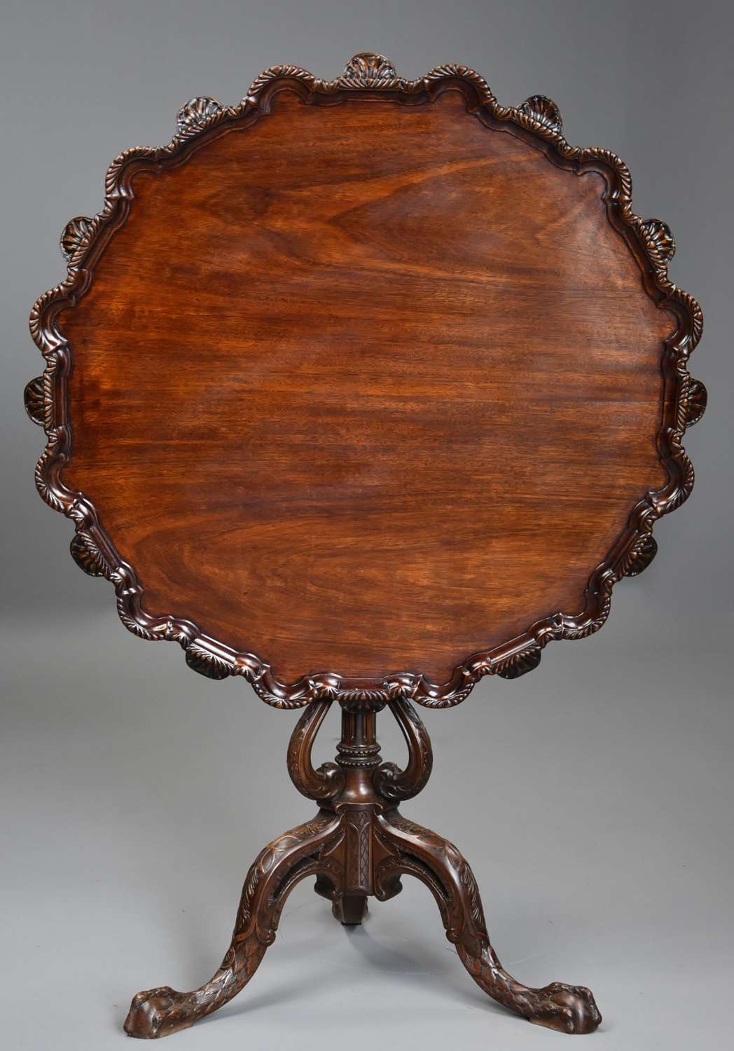 Early 20thc mahogany tilt top tripod table in the Chippendale style