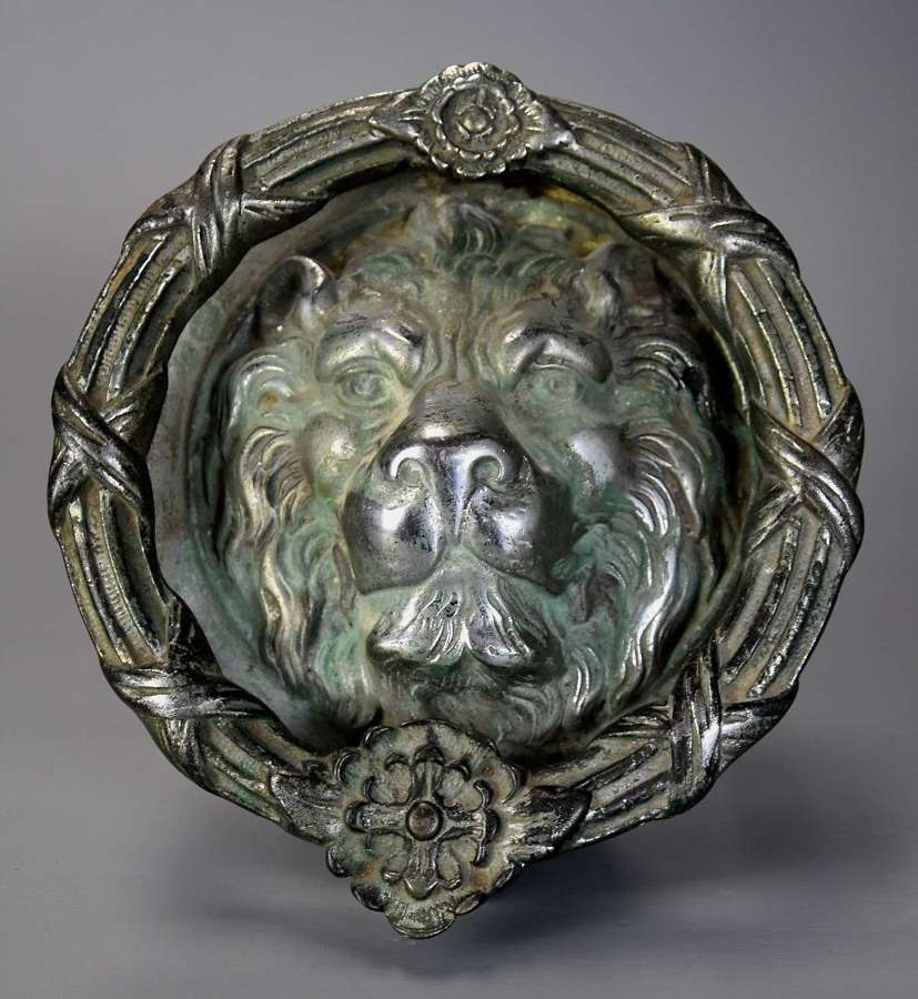 Large Regency bronze lion mask door knocker with verdigris patination