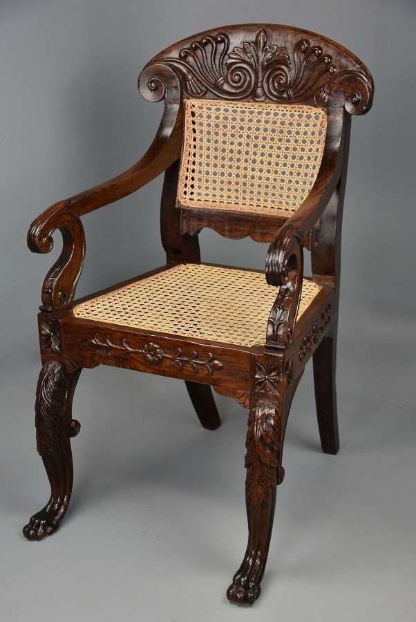Mid 19th century Anglo Indian carved padouk open armchair