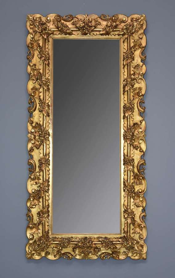 Large highly decorative 19thc Italian carved giltwood dressing mirror