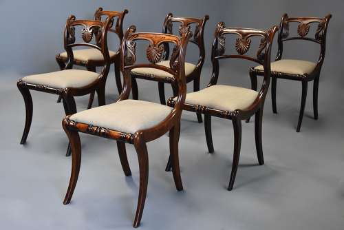 Fine quality set of thirteen Regency simulated rosewood dining chairs