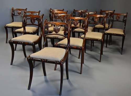 Fine quality set of thirteen Regency simulated rosewood dining chairs