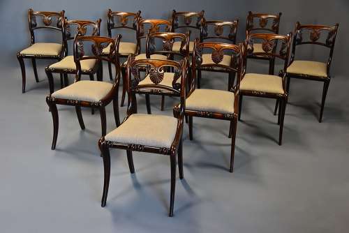 Fine quality set of thirteen Regency simulated rosewood dining chairs