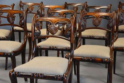 Fine quality set of thirteen Regency simulated rosewood dining chairs