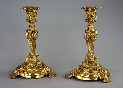 Pair of 19thc French brass candlesticks in the Rococo style