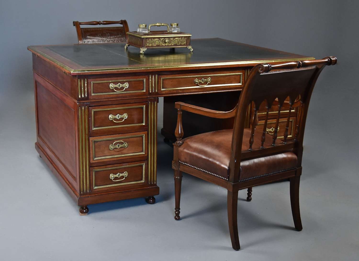 Late 19thc French mahogany partners desk in the Directoire style