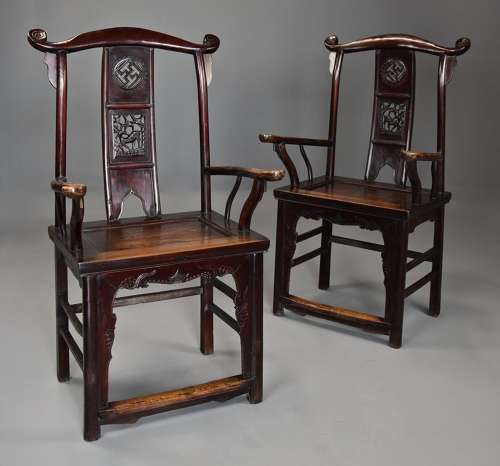 Pair of late 19thc Chinese elm yokeback armchairs of good patina