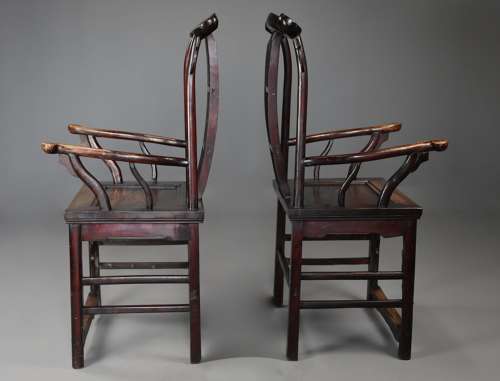 Pair of late 19thc Chinese elm yokeback armchairs of good patina