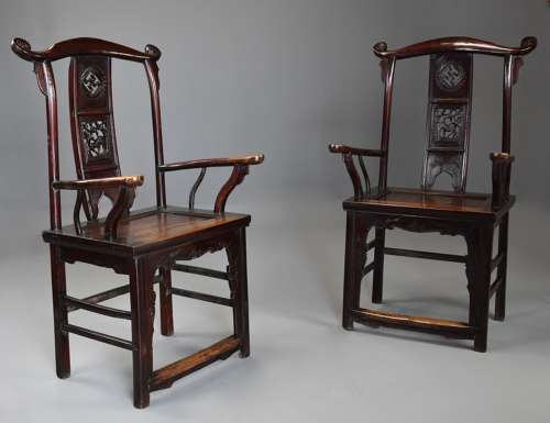 Pair of late 19thc Chinese elm yokeback armchairs of good patina