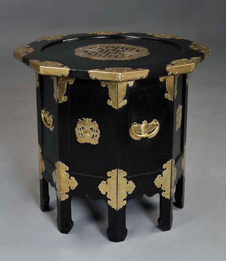 Highly decorative Oriental ebonised & brass octagonal table