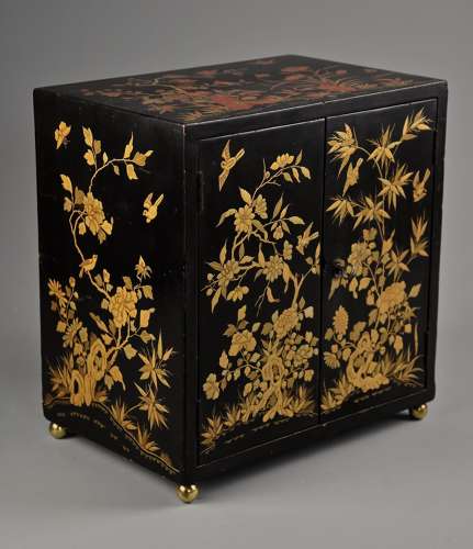 Early 20th century highly decorative Chinese lacquered table cabinet