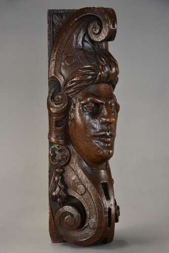 Late 17th century carved oak corbel in the style of a Medieval man, possibly Continental