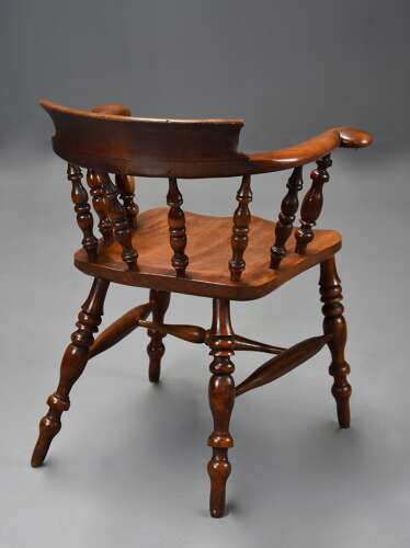 Mid 19th century birch smokers bow Windsor or Captains chair of fine patina