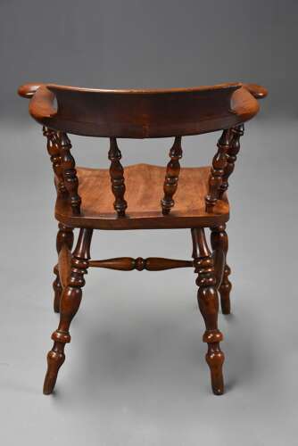 Mid 19th century birch smokers bow Windsor or Captains chair of fine patina