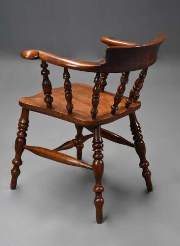 Mid 19th century birch smokers bow Windsor or Captains chair of fine patina