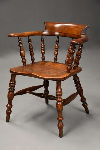 Mid 19th century birch smokers bow Windsor or Captains chair of fine patina