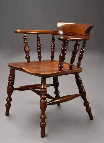 Mid 19th century birch smokers bow Windsor or Captains chair of fine patina