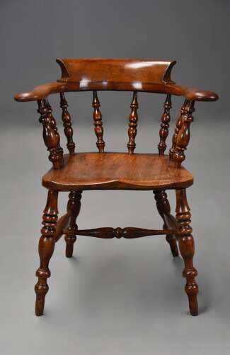 Mid 19th century birch smokers bow Windsor or Captains chair of fine patina