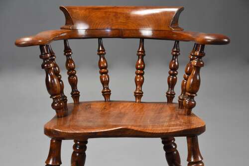 Mid 19th century birch smokers bow Windsor or Captains chair of fine patina