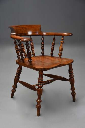 Mid 19th century birch smokers bow Windsor or Captains chair of fine patina