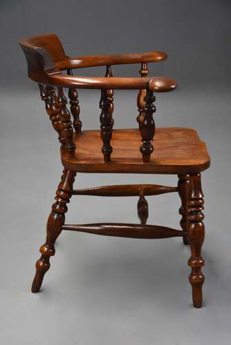 Mid 19th century birch smokers bow Windsor or Captains chair of fine patina