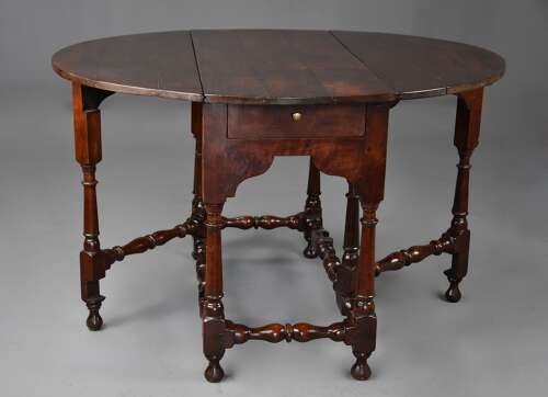 Rare early 18th century walnut gateleg table of fine patina