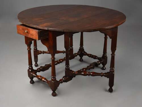 Rare early 18th century walnut gateleg table of fine patina