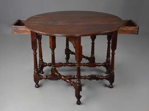 Rare early 18th century walnut gateleg table of fine patina