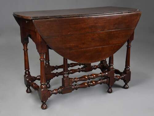 Rare early 18th century walnut gateleg table of fine patina